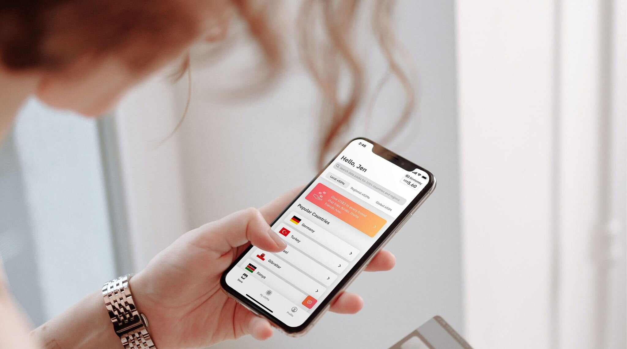 Woman choosing an eSIM on Airzalo app