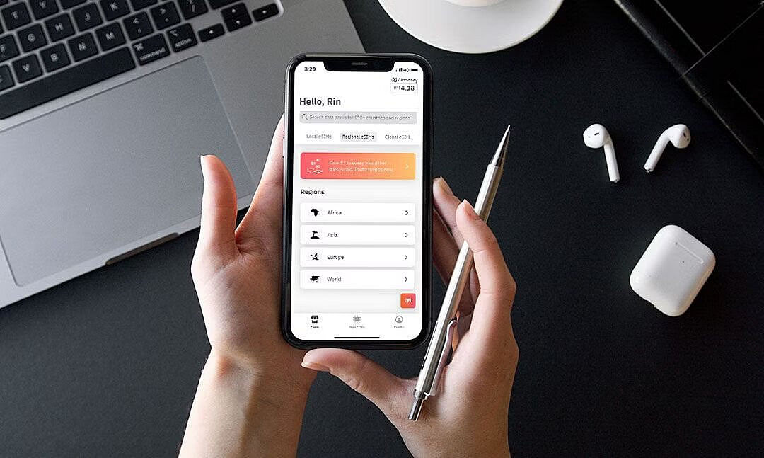 Person using Airzalo eSIM on a smartphone